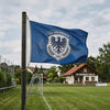 Football ground with blue club flag